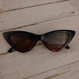 Cat eye tortoise shell sunglasses.
